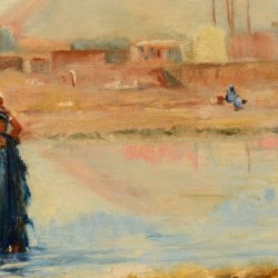 A woman in a blue dress with her baby